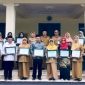 Bupati Jombang, Warsubi bersama Kepala Dinas Pendidikan dan Kebudayaan (Disdikbud) Jombang, Dra. Wor Windari, M.Si, serta Kepala Dinas Lingkungan Hidup (DLH), Miftahul Ulum, S.T., M.Si. menerima kehadiran pejuang lingkungan di Pendopo Kabupaten Jombang, Selasa (27/1/2026), tampak hadir para kepala desa, kepala sekolah, pimpinan pondok pesantren, dan pegiat lingkungan penerima penghargaan.