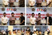 Bupati Jombang H Warsubi, SH., M.Si didampingi Ketua PWI Kabupaten Jombang Muhammad Mufid menyerahkan sejumlah penghargaan. Tampak hadir juga dalam acara ini jajaran Forkopimda Kabupaten Jombang, Sekretaris Daerah Agus Purnomo, S.H., M.Si., Ketua PWI Jombang Muhammad Mufid dan pengurus serta Kepala OPD di lingkungan Pemerintah Kabupaten Jombang. Photo istimewa: Humas Dinas Kominfo Pemkab Jombnamg.