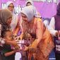 Ketua Tim Pembina Posyandu Kabupaten Jombang, Ibu Yuliati Nugrahani Warsubi, didampingi Ning Ema Erfina (istri Wakil Bupati Jombang), dan Ketua DWP Kabupaten Jombang, Ibu Lilik Agus Purnomo, memperingati hari Posyandu Nasional 2026 di Posyandu Rosalia Indah, Dusun Jabon, Desa Bawangan, Kecamatan Ploso, dengan dihadiri sedikitnya 250 undangan dari berbagai elemen pemangku kepentingan, Rabu (29/4/2026). 
