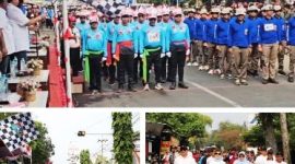 Photo atas: Bupati Jombang mengibarkan bendera start untuk memberangkatkan peserta Gerak Jalan ROJO 2026. Photo bawah kiri: Ketua Tim Penggerak PKK Yuliati Nugrahani Warsubi mengankat bendera start. Selanjutnya, photo kanan bawah: Bupati Warsubi bersama para pejabat yang hadir turut berjalan menyusuri sebagian rute Gerak Jalan ROJO 2026, tampak Wakil Bupati (depan kanan) menyempatkan diri menyapa warga yang hadir menyaksikan kegiatan ini. 