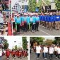 Photo atas: Bupati Jombang mengibarkan bendera start untuk memberangkatkan peserta Gerak Jalan ROJO 2026. Photo bawah kiri: Ketua Tim Penggerak PKK Yuliati Nugrahani Warsubi mengankat bendera start. Selanjutnya, photo kanan bawah: Bupati Warsubi bersama para pejabat yang hadir turut berjalan menyusuri sebagian rute Gerak Jalan ROJO 2026, tampak Wakil Bupati (depan kanan) menyempatkan diri menyapa warga yang hadir menyaksikan kegiatan ini. 