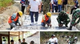 Tampak Bupati Jombang H Warsubi bersama Komandan Kodim 0814/Jombang Letkol Kav. Dicky Prasojo, S.H., M.Han meninjau pembangunan jalan dan rumah warga usai dilakukan bedah rumah dengan anggaran APBD Pemkab Jombang, Kamis (8/10/2026). Photo: istimewa