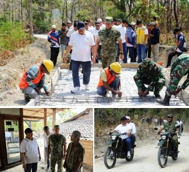 Tampak Bupati Jombang H Warsubi bersama Komandan Kodim 0814/Jombang Letkol Kav. Dicky Prasojo, S.H., M.Han meninjau pembangunan jalan dan rumah warga usai dilakukan bedah rumah dengan anggaran APBD Pemkab Jombang, Kamis (8/10/2026). Photo: istimewa