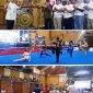 Photo atas: Rektor UNIPDU DR dr H M Zulfikar As’ad, M.MR (kiri) melakukan pemukulan gong menandai Kejuaraan Piala Gunbernur Jatim & Piala Rektor UNIPDU dimulai. Photo bawah atlet Wushu memperagakan kelas Taulo (seni)  dan Kelas Sando (tarung), Jum’at (30/10/2026) di Gelora Abi As’ad, Peterongan, Kabupaten Jombang. Photo: https://layang.co 